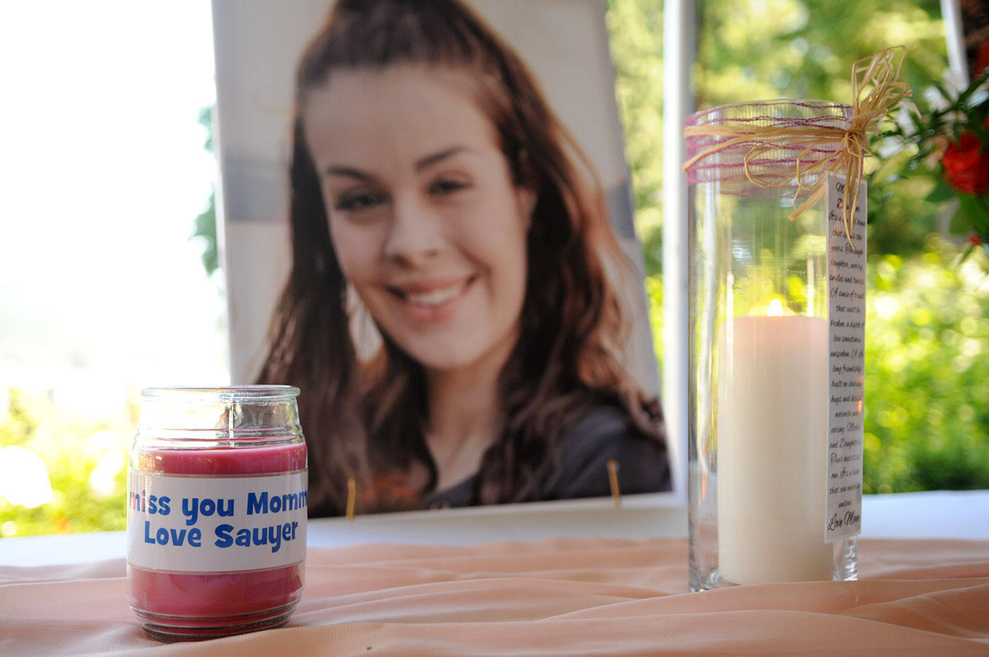 Candles with messages from Shaelene Bell’s two boys were lit during her celebration of life at Sandpiper Resort on Saturday, June 26, 2021. Bell’s mother Alina Durham is urging people to write to Canada’s Governor General Mary Simon asking for a bill to be passed to help create Shaelene’s Missing Adult Alert. (Jenna Hauck/ Chilliwack Progress file)