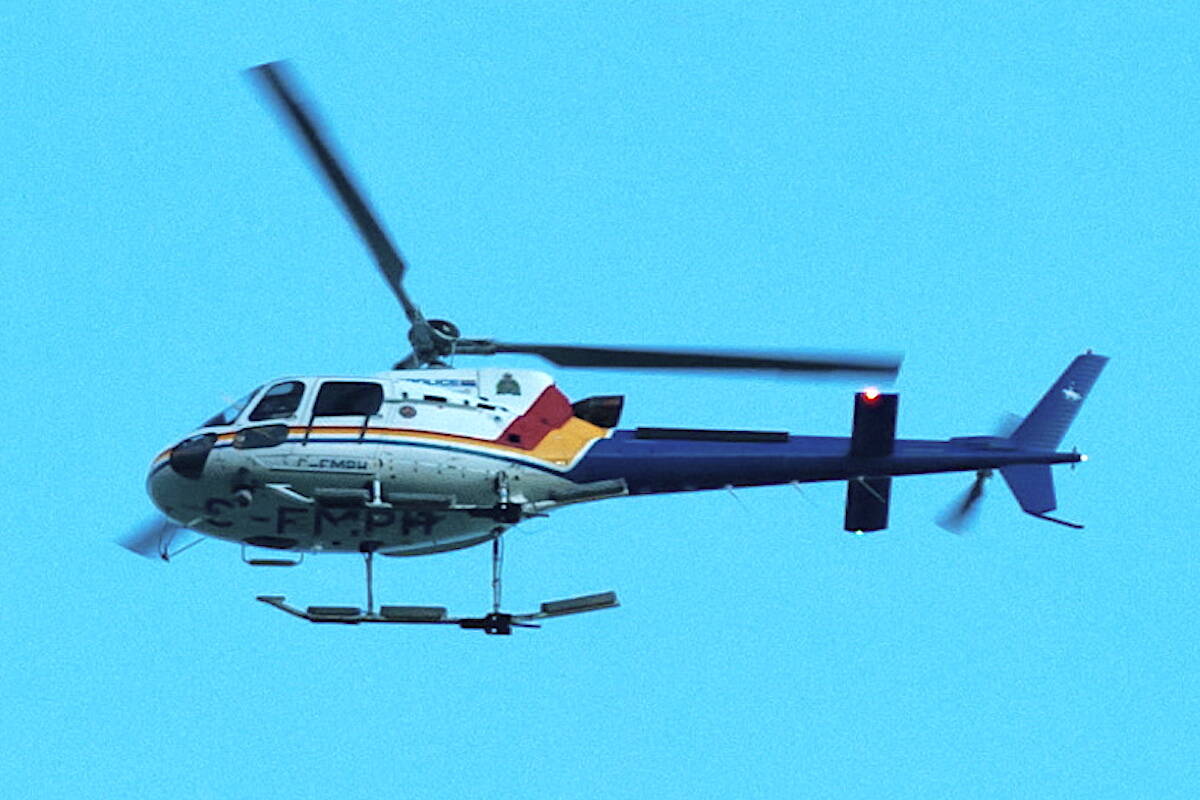 An RCMP air services pilot, along with a police dog and its handler, helped resolve a mental health incident in the Shuswap on Thanksgiving weekend. One woman was arrested under the Mental Health Act. (THE CANADIAN PRESS/Marc Grandmaison)