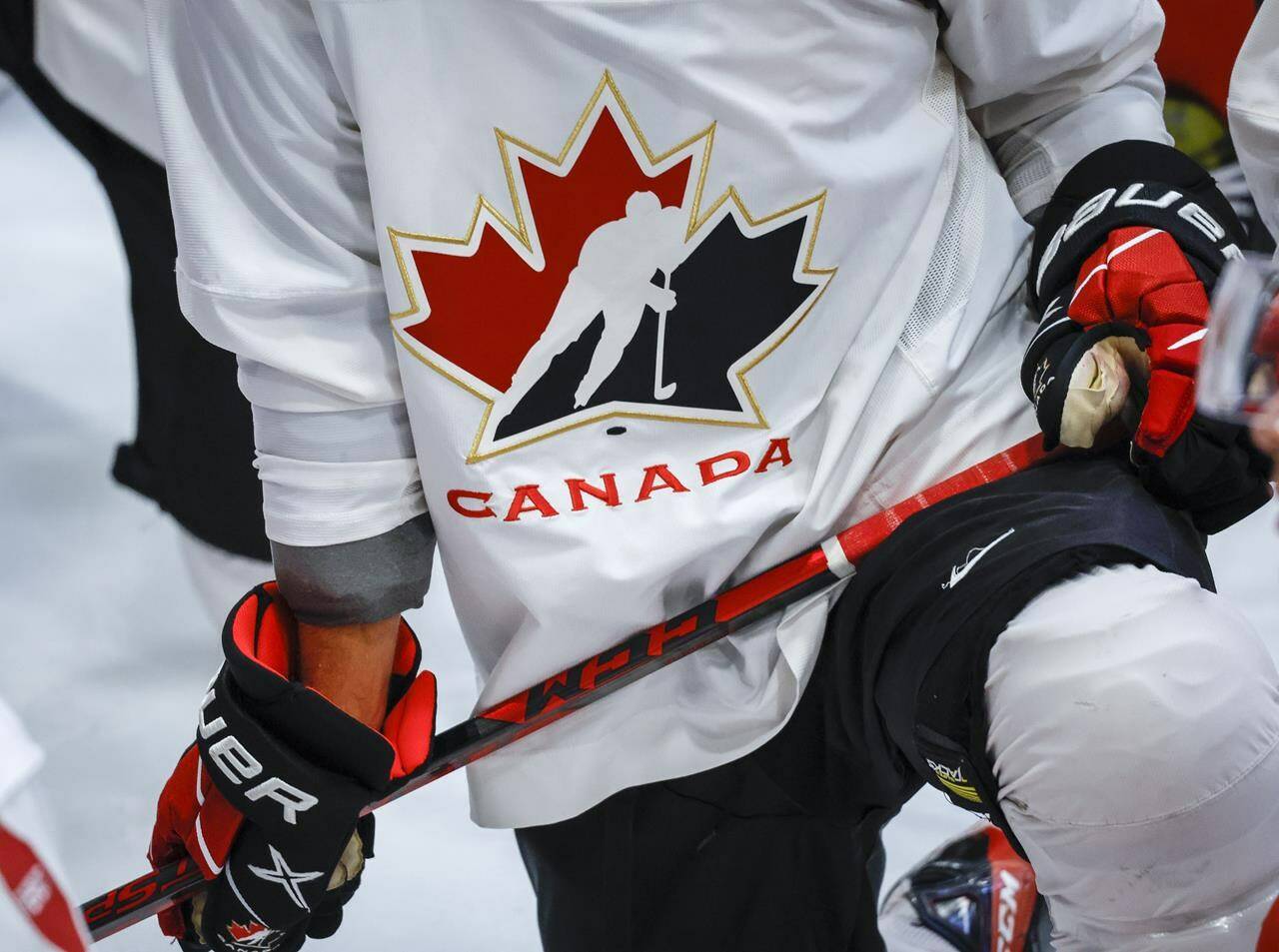 A Hockey Canada logo is shown on the jersey of a player with Canada’s National Junior Team during a training camp practice in Calgary, Alta., Tuesday, Aug. 2, 2022. Nike has suspended its partnership with and paused support for Hockey Canada as the sports organization faces increasing pressure to handle alleged sexual assaults. THE CANADIAN PRESS/Jeff McIntosh