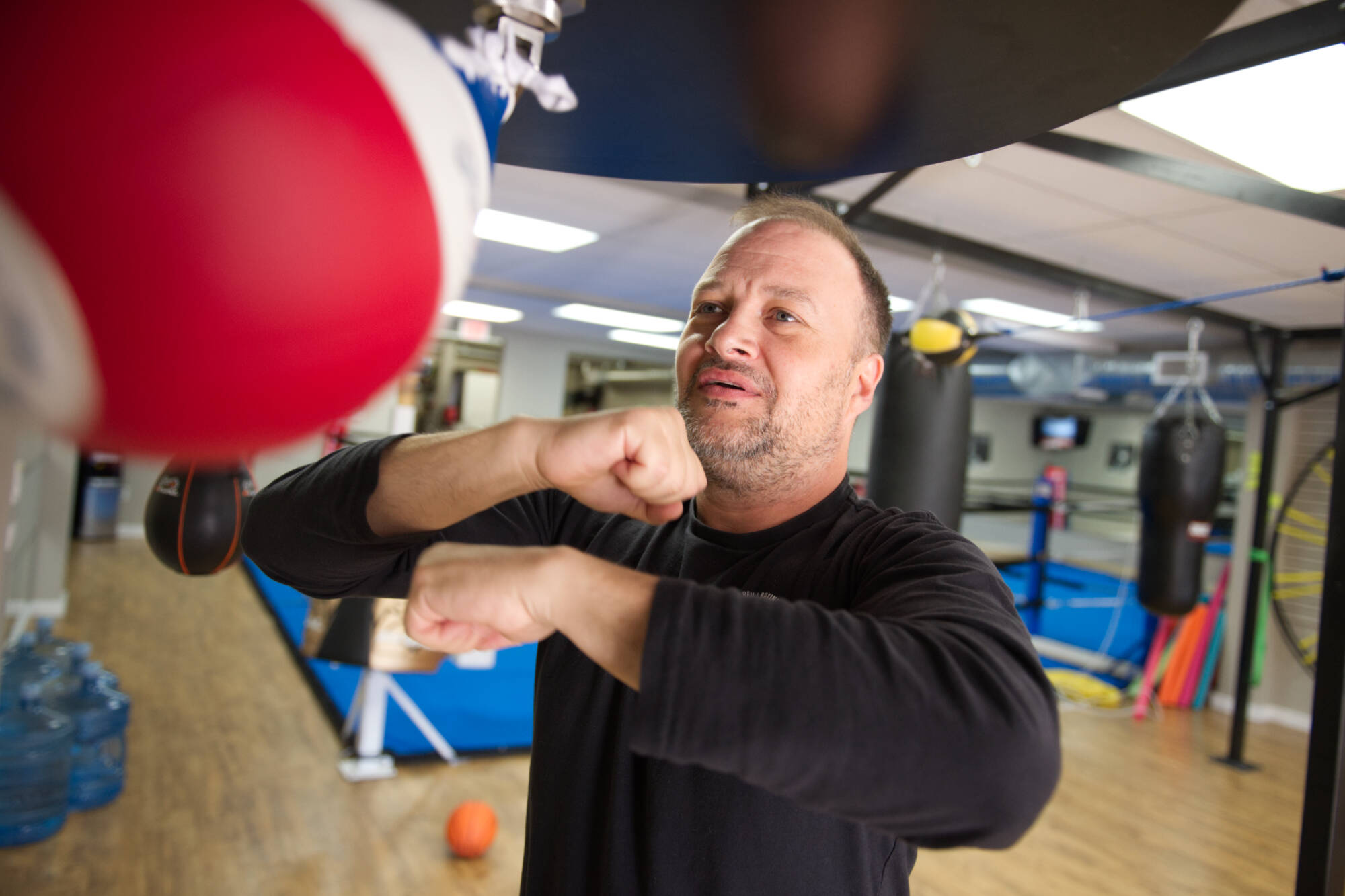 Whizbang Boxing coach and co-owner Shawn Desautels works the speed bag. (Lachlan Labere-Salmon Arm Observer)