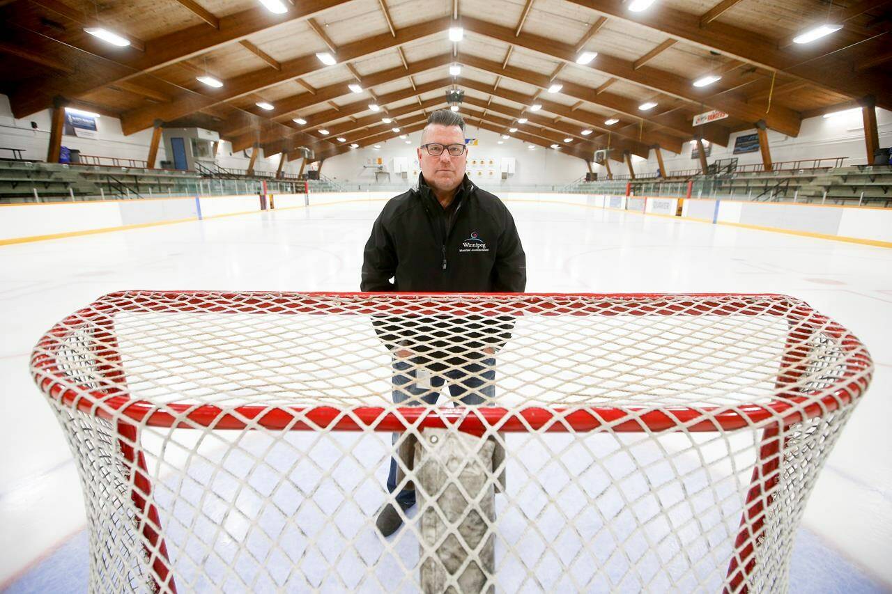 Todd McDonald, supervisor of arena and aquatic assets for the City of Winnipeg, is photographed at Eric Coy Arena in south Winnipeg, Friday, Oct.14, 2022. McDonald says it’s harder to refrigerate the rinks these days because of temperature changes. Cities are looking for more efficient ways to cool arenas. THE CANADIAN PRESS/John Woods
