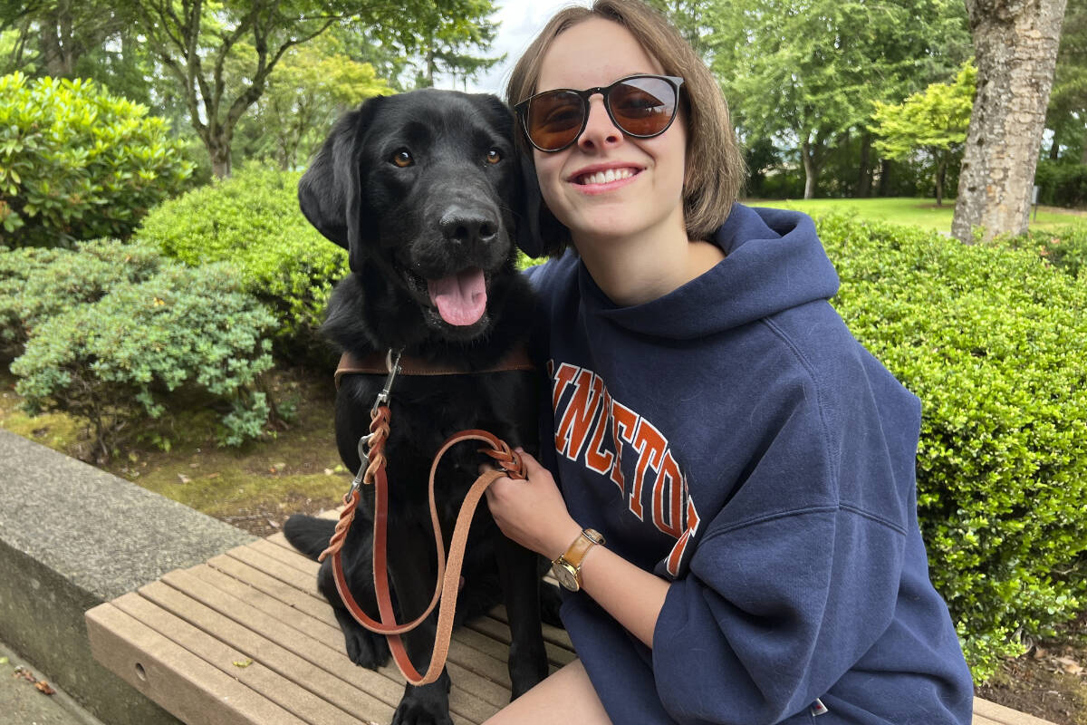 Vernon’s Nina Steyn with Doc, the black lab, at Camp GDB – Guide Dogs for the Blind – in June near Portland, Ore. The 17-year-old Vernon youth became the first Canadian to attend camp that helps visually impaired people work and live with a guide dog. (Ian Burke photo)