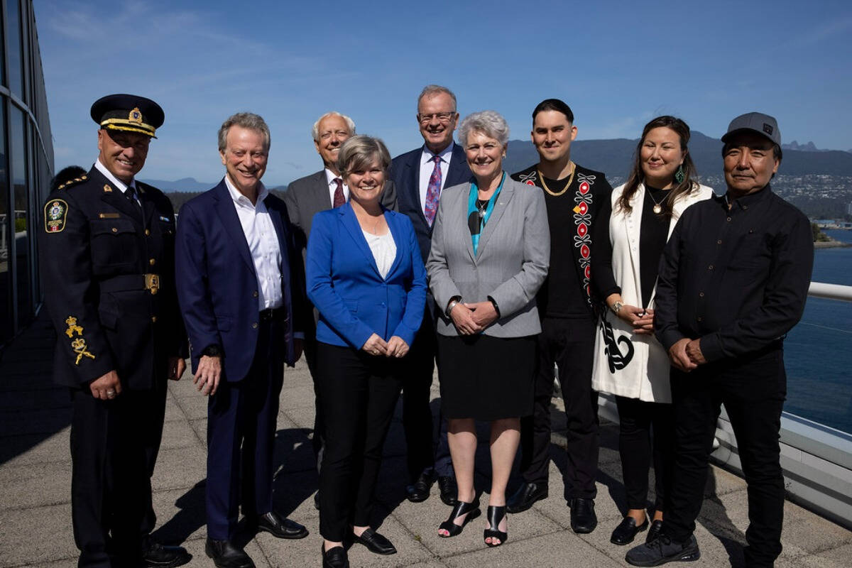 Tahltan president Chad Norman Day (third from the right) stands with Minister of Forests Katrine Conroy (fourth from the right) and others in Victoria on Oct. 18, 2022. The parties struck a deal to develop a wildlife regime to protect Tahltan wildlife, culture and way of being. (B.C. Government photo)