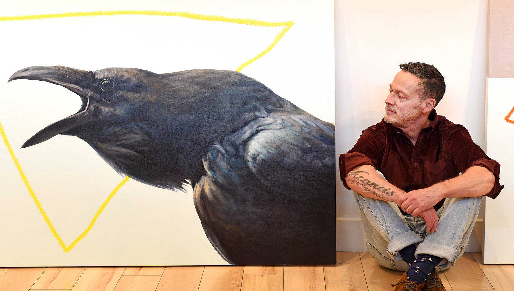 September 16, 2022 -  Artist Joe Coffey with one of his paintings at the Madrona Gallery.. Don Denton photo
