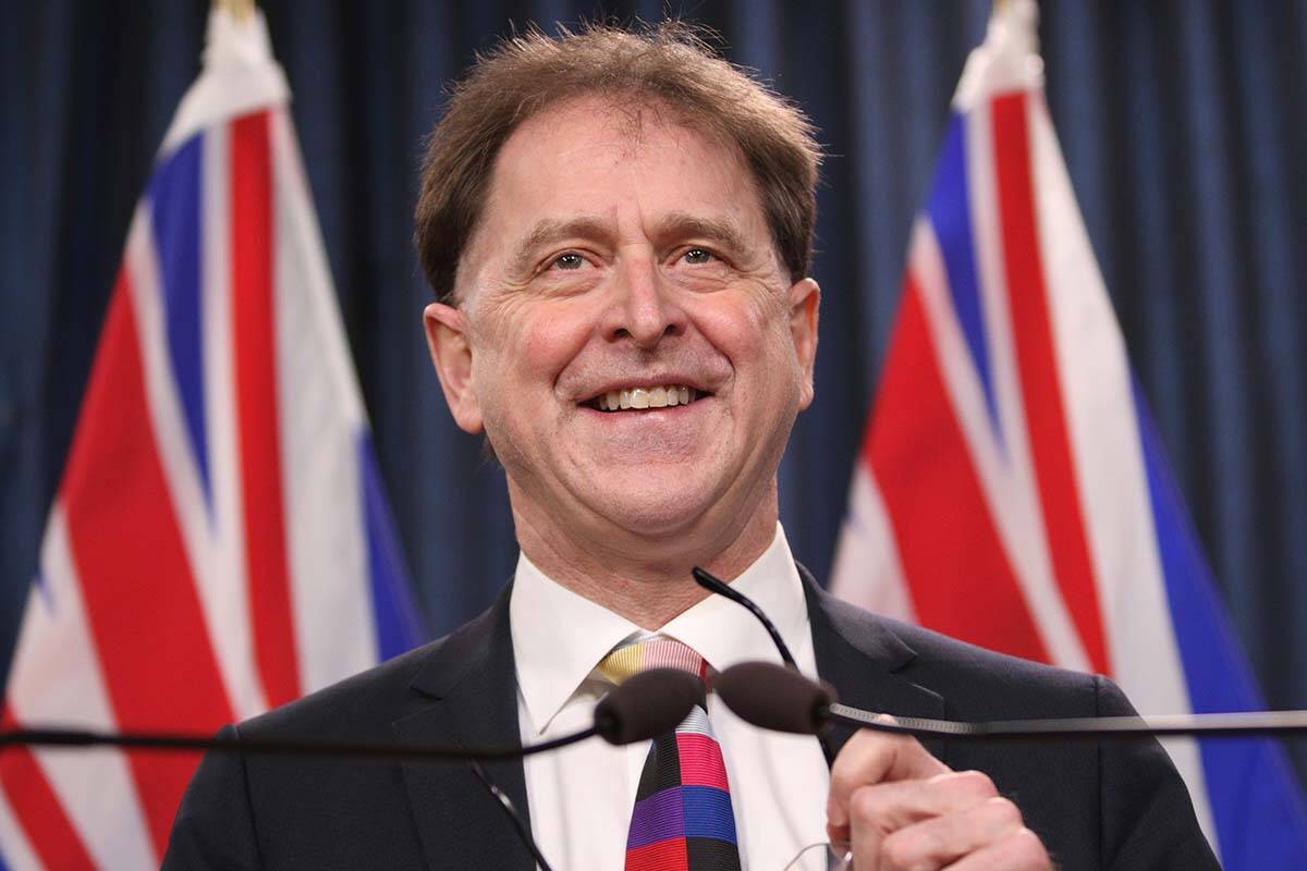 Health Minister Adrian Dix speaks in the press theatre at the legislature in Victoria, B.C., on March 10, 2022. On Oct. 19, he tabled new health legislation that would provide stronger oversite of health professions in B.C. THE CANADIAN PRESS/Chad Hipolito