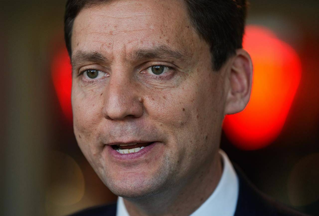 B.C. NDP leadership candidate David Eby responds to questions while speaking with reporters in Vancouver, on Wednesday, October 19, 2022. THE CANADIAN PRESS/Darryl Dyck