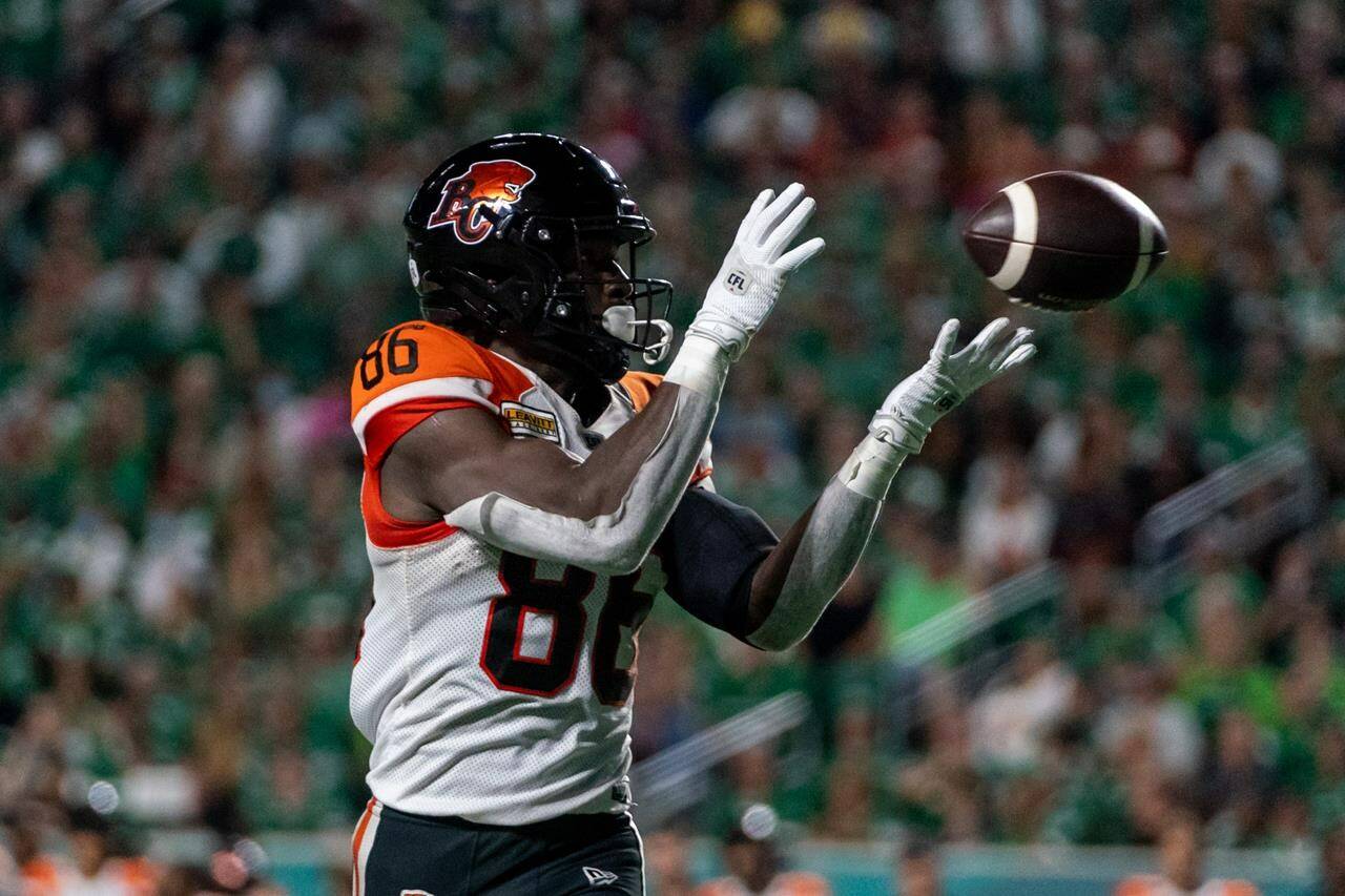 BC Lions receiver Jevon Cottoy (86) catches the football against Saskatchewan Roughriders during the fourth quarter of CFL football action against BC Lions in Regina on August 19, 2022. THE CANADIAN PRESS/Heywood Yu