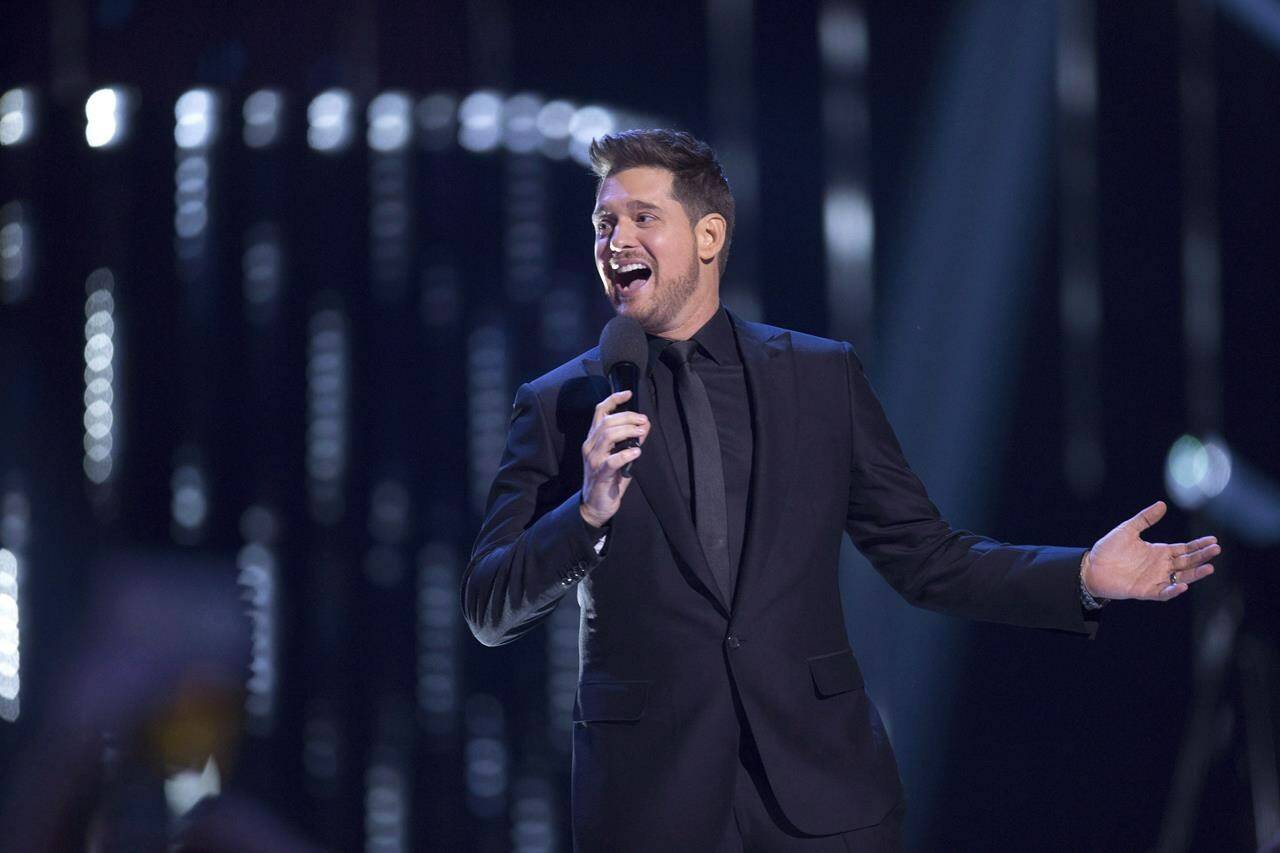 Host Michael Buble is shown on stage at the Juno Awards in Vancouver, Sunday, March, 25, 2018. Buble is set to be a guest judge for “Michael Bublé Night” on “Dancing with the Stars.” THE CANADIAN PRESS/Darryl Dyck