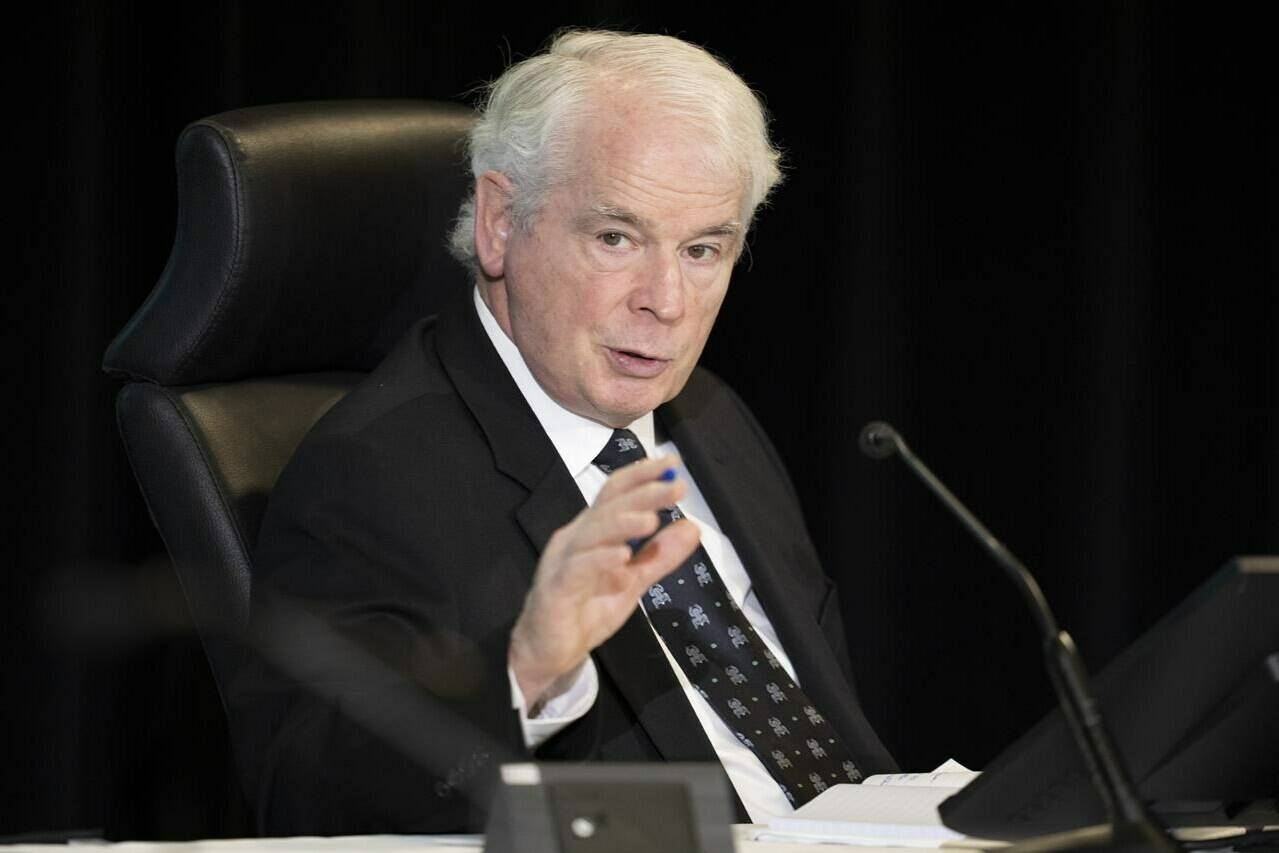 Public Order Emergency Commission’s Commissioner Paul Rouleau speaks to counsel during a witnesses testimony, Monday, October 31, 2022 in Ottawa. THE CANADIAN PRESS/Adrian Wyld