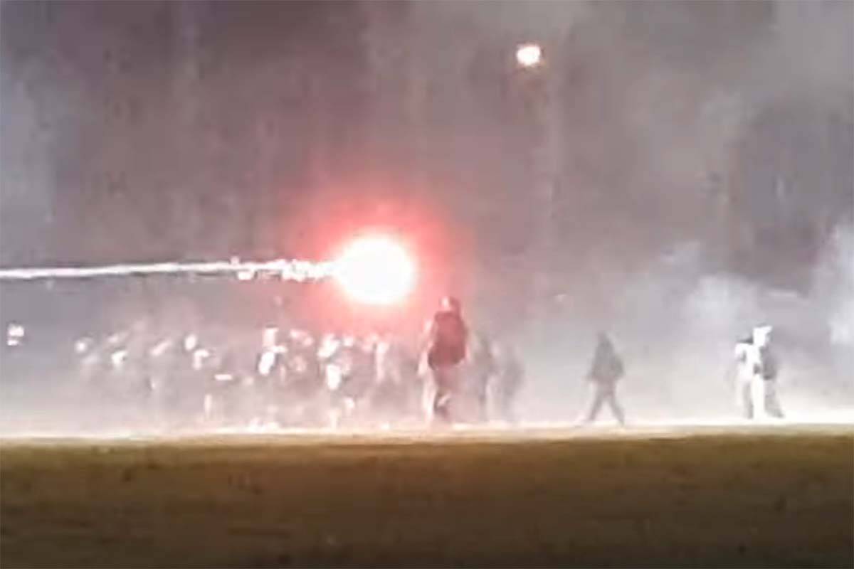 A screenshot from a police-provided video taken near South Delta Secondary School on Oct. 31, 2022 shows fireworks being shot by a large gathering of youths. Delta police are investigating possible assaults and property damage from the night. (Screenshot/Delta Police Department)