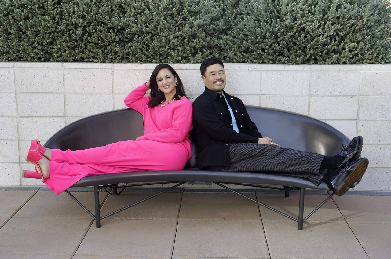 Melissa Fumero, left, and Randall Park, cast members in the Netflix series “Blockbuster,” pose together for a portrait, Monday, Oct. 24, 2022, in Los Angeles. (AP Photo/Chris Pizzello)