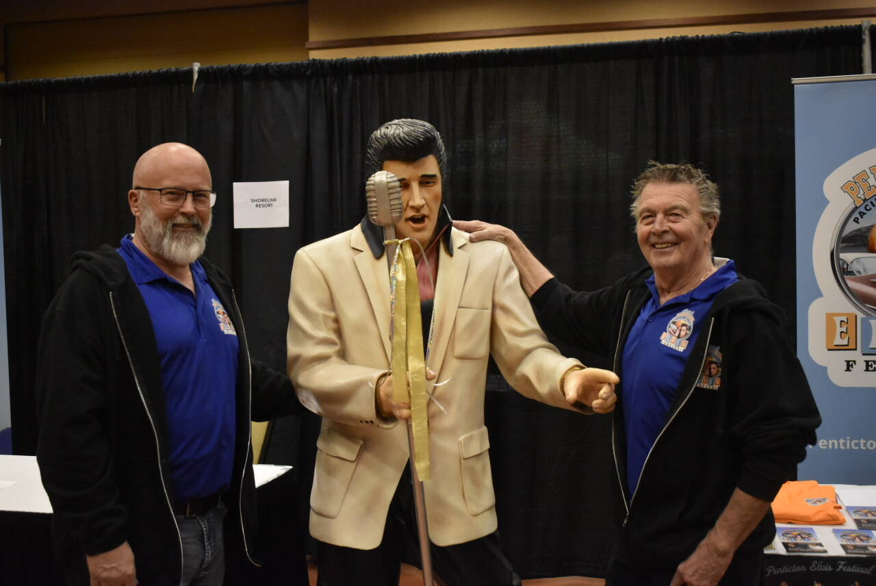 Dave Martin (right), the president of the Penticton Elvis Festival, was thrilled with how many local residents showed enthusaiasm towards his upcoming event at his booth at the TRUE Penticton Tourism and Job Fair. (Logan Lockhart- Western News)