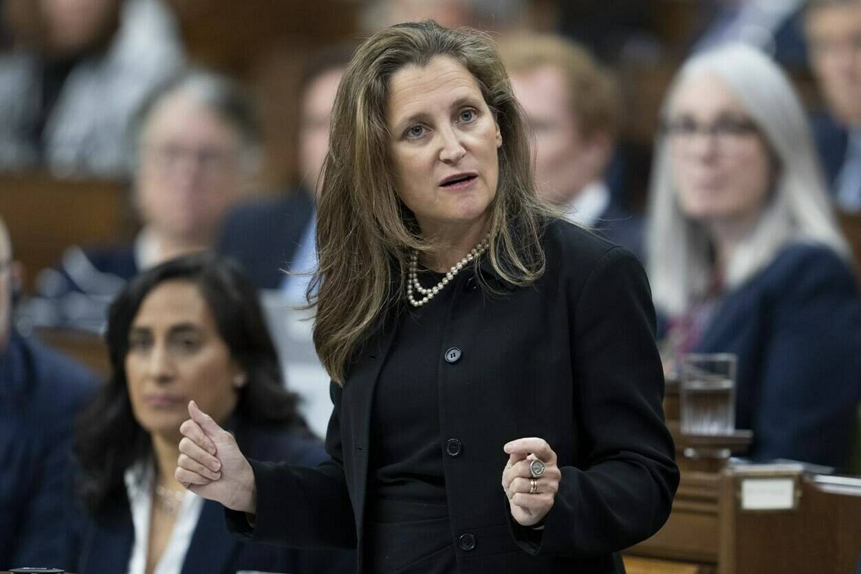 Deputy Prime Minister and Finance Minister Chrystia Freeland rises during question period, in Ottawa, Monday, Sept. 26, 2022. Finance Minister Chrystia Freeland will table her mid-year budget update in the House of Commons today focused heavily on driving investment to Canada’s clean energy industries in response to new American tax incentives signed into law last summer. THE CANADIAN PRESS/Adrian Wyld