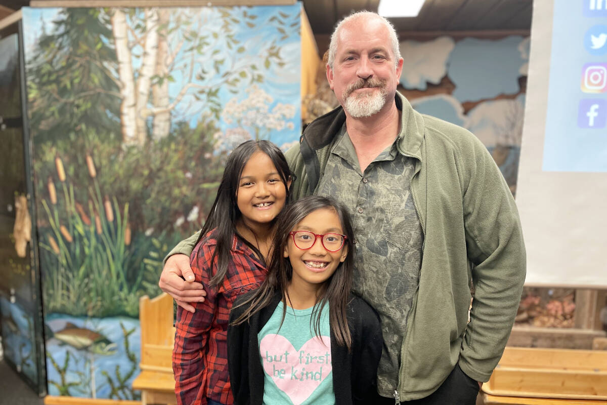 Dr. Chris Shepherd, right, with his daughters Raven, left, and Robyn, at the Scout Island Nature Centre on Oct. 20, 2022. (Ruth Lloyd photo - Williams Lake Tribune)