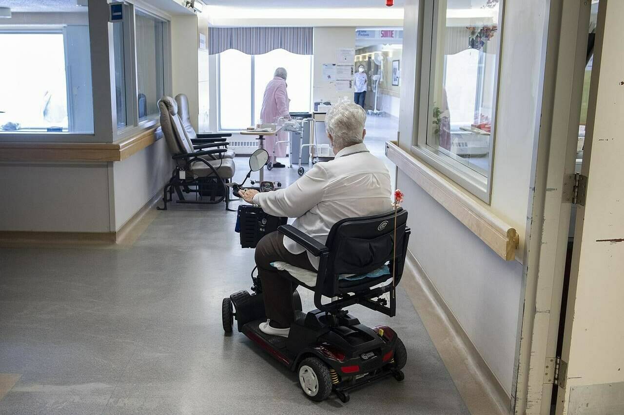 Residents are shown at Idola Saint-Jean long-term care home in Laval, Que., February 25, 2022. In B.C., long-term care residents and their family members are being promised a stronger voice with the creation of new regional councils and a provincial committee. CANADIAN PRESS/Graham Hughes