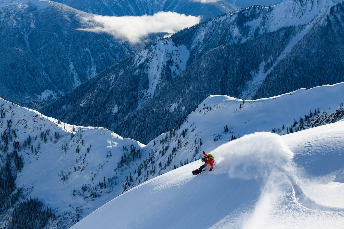 A snowboarder in the Selkirk Mountains. (Photo by Dan Stewart)