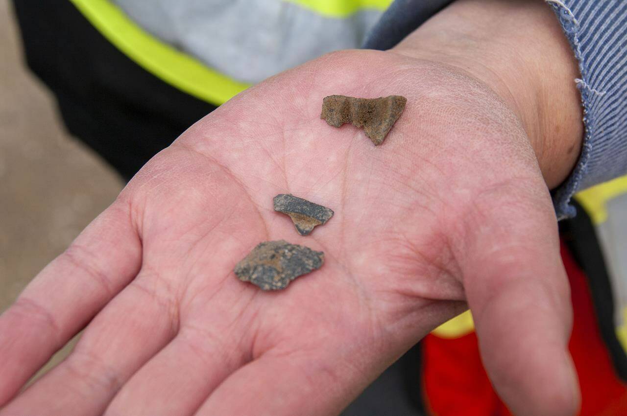 B.C. archaeologists discovered a projectile point and other archaeological materials, seen in an Oct. 14, 2022, handout photo, during excavation work at the Boitanio Mall site on Wiliams Lake, British Columbia. THE CANADIAN PRESS/HO-Williams Lake First Nation