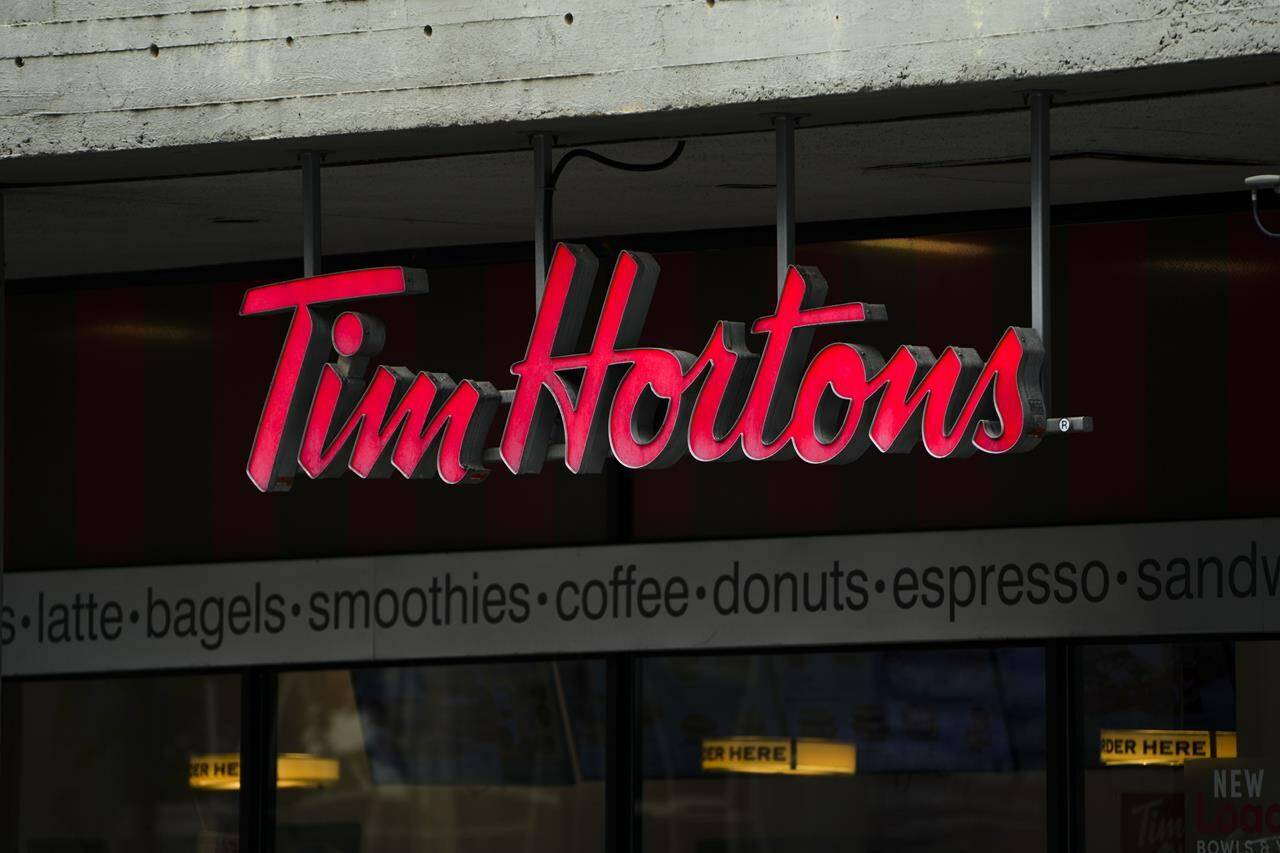 Tim Hortons signage is pictured in Ottawa on Wednesday Sept. 7, 2022. A Tim Hortons branded chicken noodle soup base was recalled in Alberta and Ontario because it contained insects. THE CANADIAN PRESS/Sean Kilpatrick