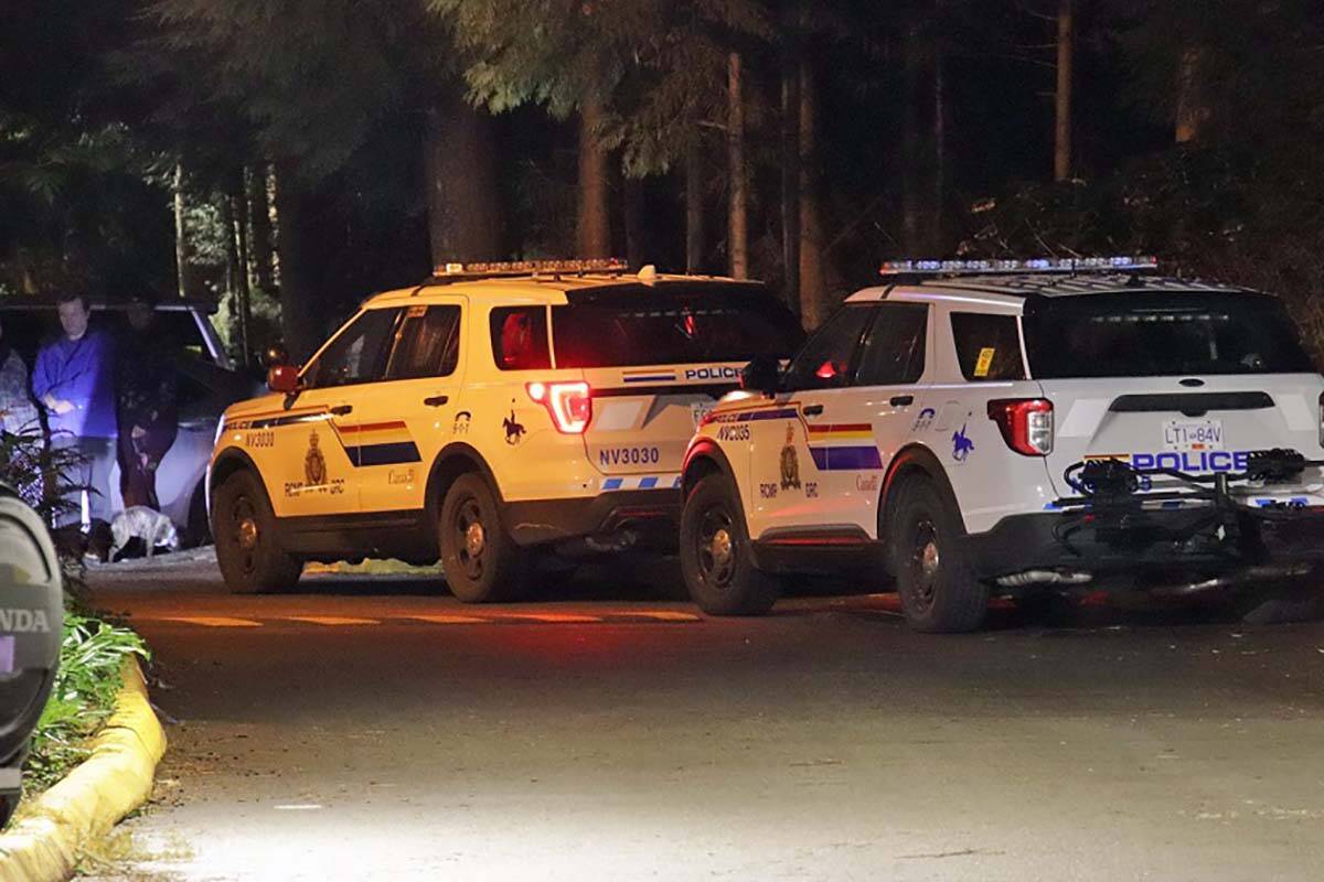 The scene outside a North Vancouver townhouse complex on the evening of Nov. 12, 2022, after a woman was fatally shot by RCMP officers. (Credit: Shane MacKichan)