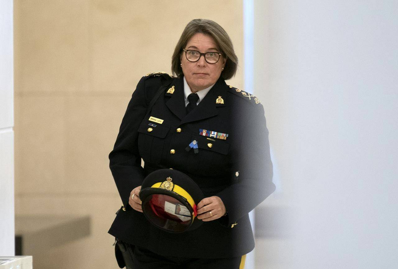 RCMP Commissioner Brenda Lucki makes her way to the Standing Committee on Public Safety and National Security, in Ottawa, Monday, Oct. 31, 2022. THE CANADIAN PRESS/Adrian Wyld