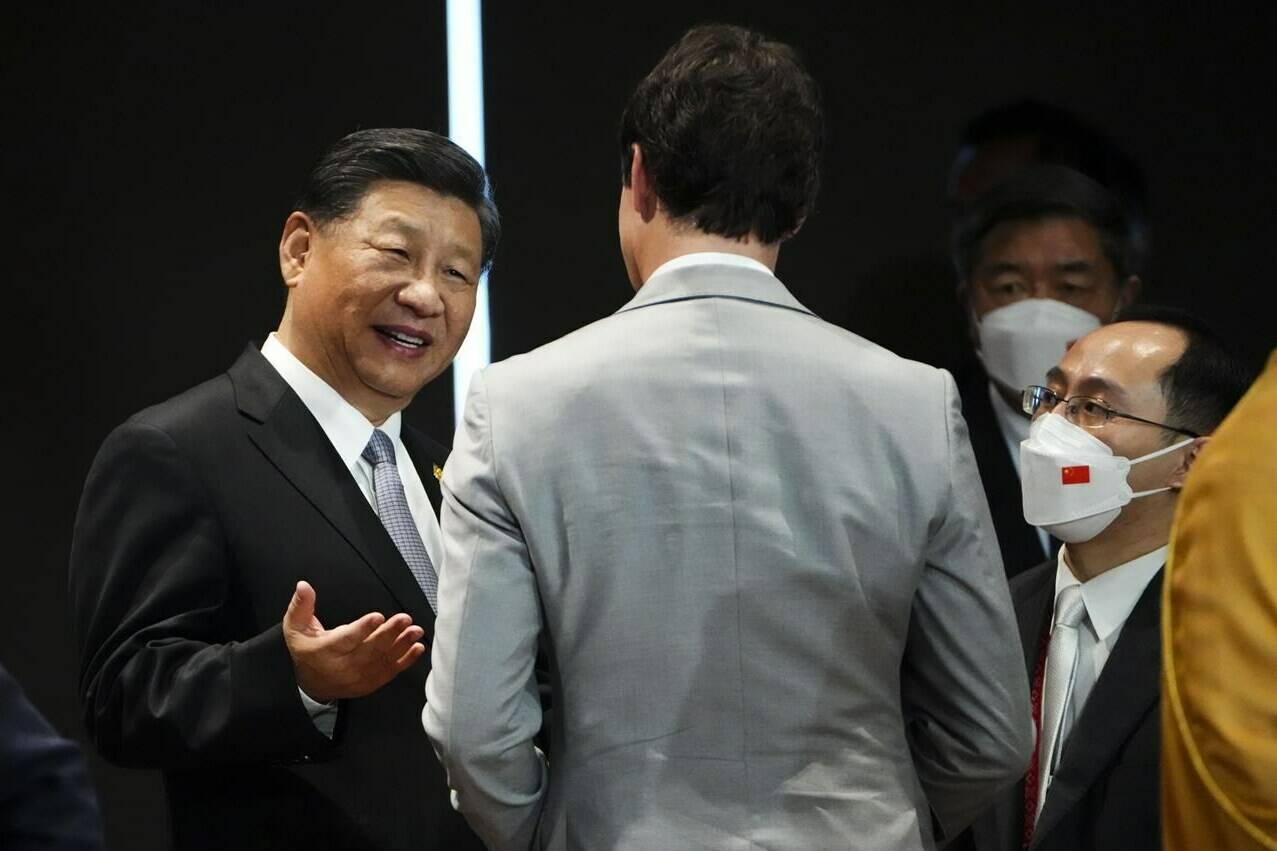 Prime Minister Justin Trudeau talks with Chinese President Xi Jinping after taking part in the closing session at the G20 Leaders Summit in Bali, Indonesia on Wednesday, Nov. 16, 2022. THE CANADIAN PRESS/Sean Kilpatrick