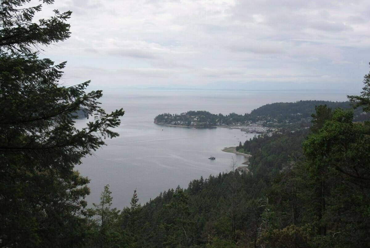 A view of Gibsons Landing from the top of Soames Hill, a short but steep hike on British Columbia’s Sunshine Coast, is seen near the town of Grantham’s Landing, B.C., on May 23, 2016. A state of local emergency in response to drought along British Columbia’s Sunshine Coast has been lifted as the regional district says water flows were high enough in a key water source.THE CANADIAN PRESS/Lauren Krugel