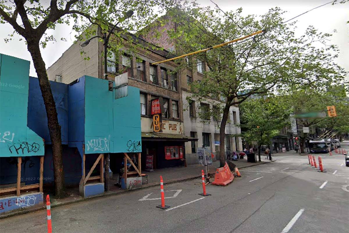 The Grand Union Hotel SRO at the corner of Abbott and West Hastings streets in Vancouver. Police say they found a teen there Nov. 19 unlawfully entering a room, holding a loaded gun. (Google Streetview)