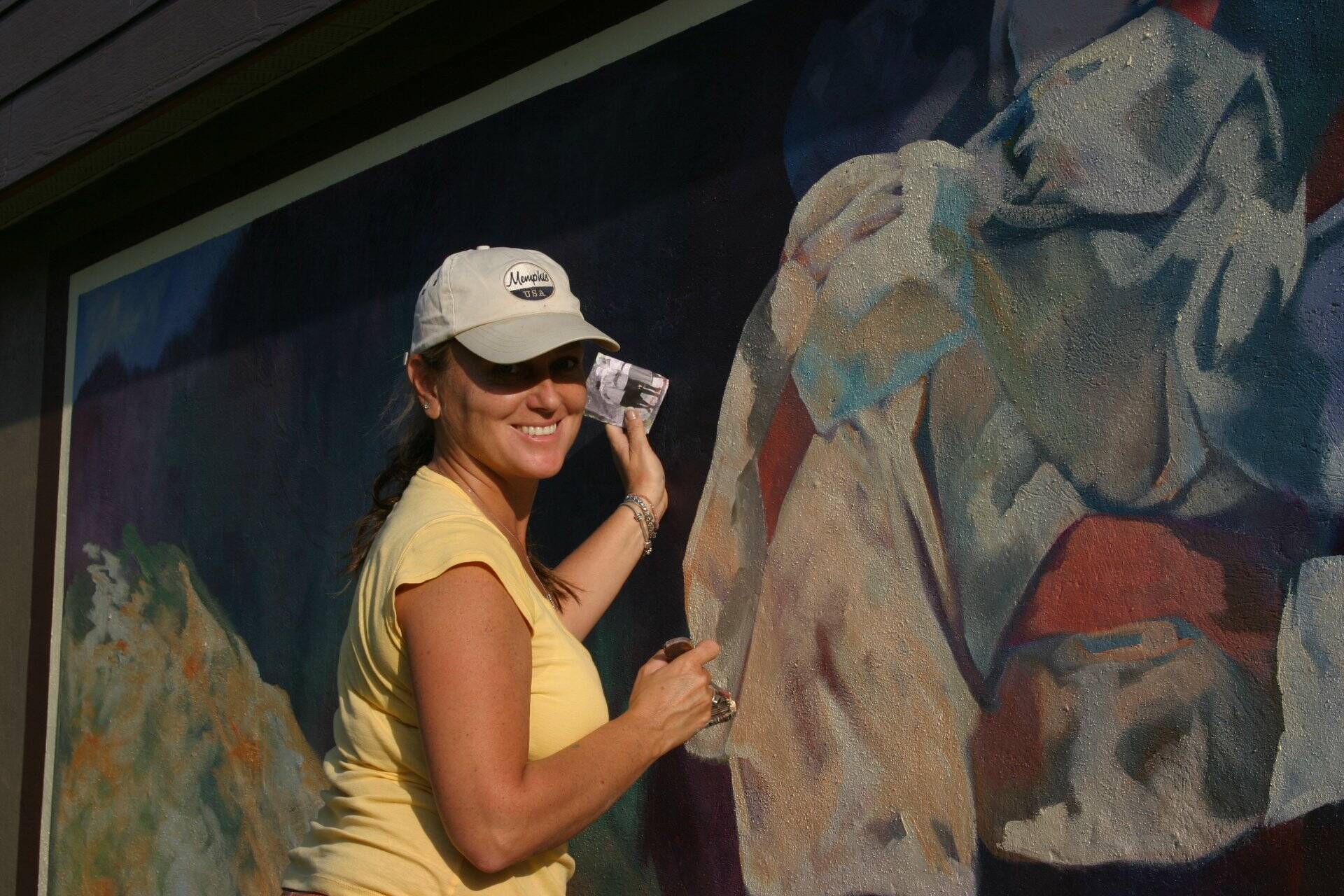 Vernon artist Michelle Loughery, who had a hand creating 27 out of 28 of Vernon’s historic downtown murals, is pleased the city will spend up to $100,000 to upgrade the works. (File photo)