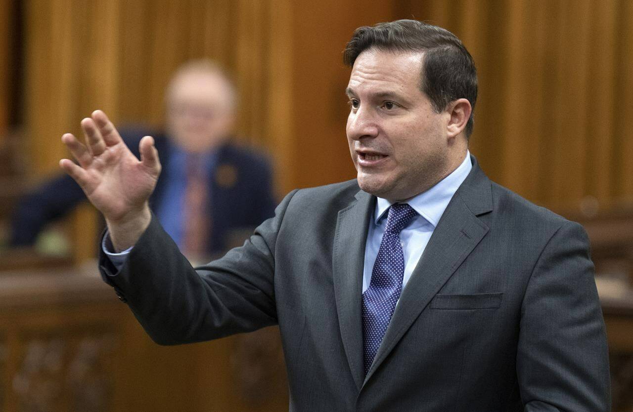 Public Safety Minister Marco Mendicino rises during Question Period, in Ottawa, Friday, Nov. 25, 2022. Mendicino is accusing the Conservatives of “whipping up fear” that the Liberal government is outlawing ordinary long guns and hunting rifles.THE CANADIAN PRESS/Adrian Wyld