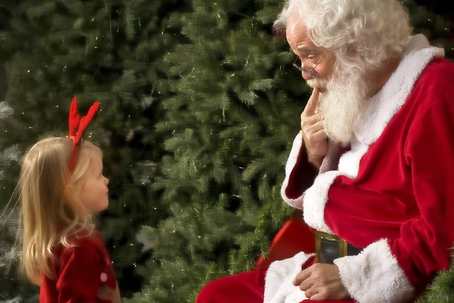 Santa Claus (Chris Emery) has been hearing Christmas wishes at the Centenoka Park Mall for more than 14 years. (Brian Bannister photo)