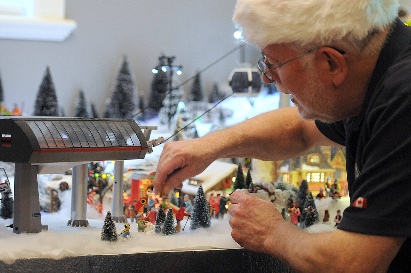 Terry Campbell’s display of Christmas miniatures takes up the entire dining room of his Chilliwack home. He started the display in 2007 but it has been more challenging for him lately as he’s been legally blind since 2018. (Jenna Hauck/ Chilliwack Progress)