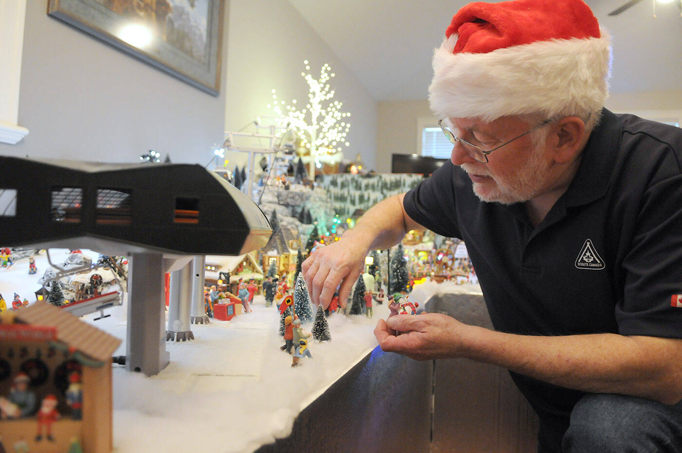 Terry Campbell’s display of Christmas miniatures takes up the entire dining room of his Chilliwack home. He started the display in 2007 but it has been more challenging for him lately as he’s been legally blind since 2018. (Jenna Hauck/ Chilliwack Progress)