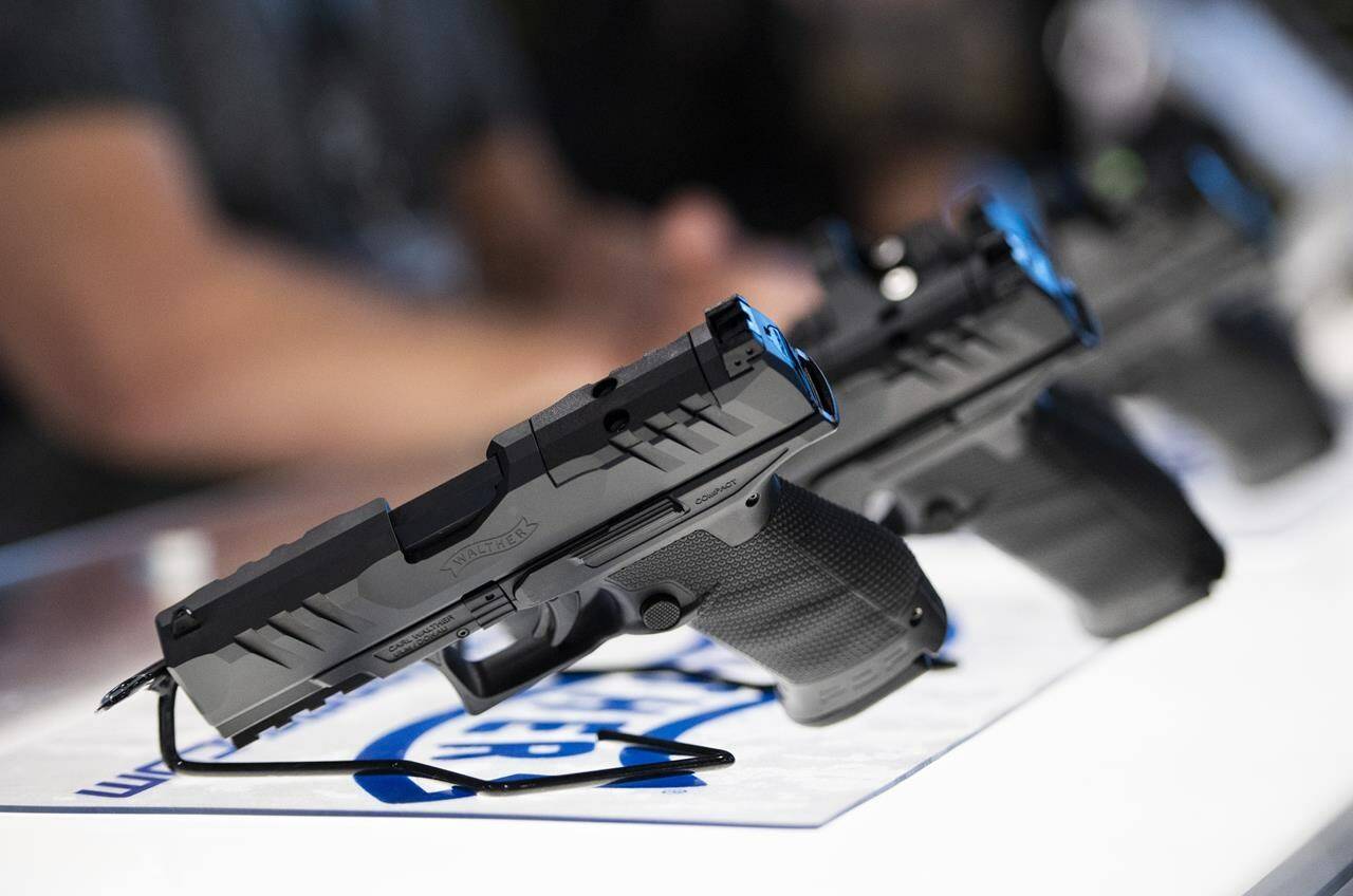 A Walther PDP pistol is seen at the booth of an exhibitor that provides weapons to government, military and law enforcement clients, at the CANSEC trade show in Ottawa, on Wednesday, June 1, 2022. THE CANADIAN PRESS/Justin Tang