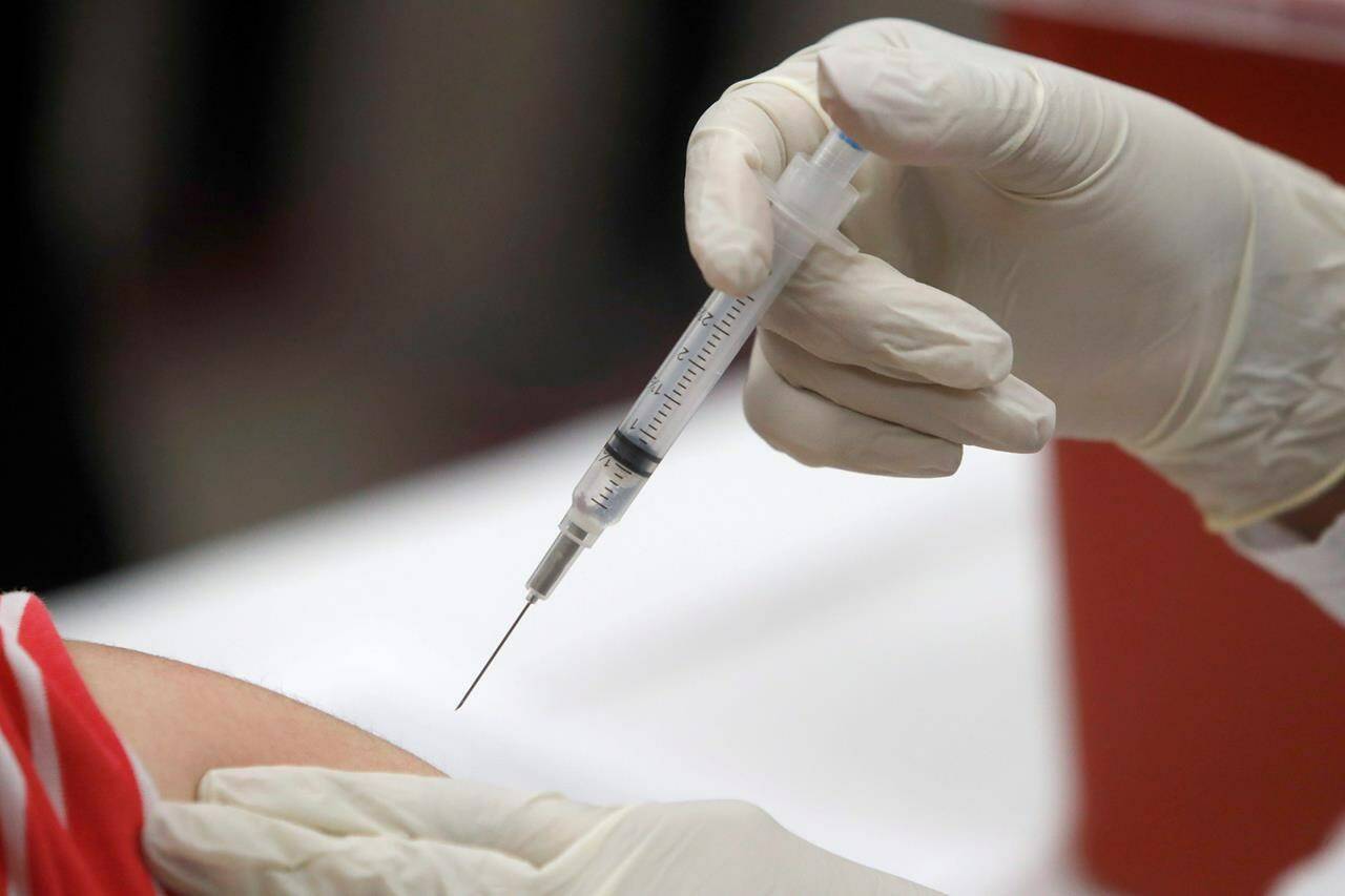 A patient receives an influenza vaccine in Mesquite, Texas, on Thursday, Jan. 23, 2020. The flu has returned with a vengeance after being absent for a couple of years during the COVID-19 pandemic. It’s hitting children especially hard. THE CANADIAN PRESS/AP-LM Otero