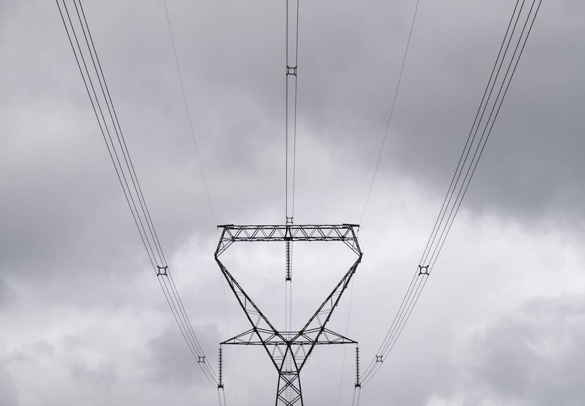 Power lines are seen against cloudy skies near Murvale, Ont. northwest of Kingston, Wednesday, Sept. 7, 2022 in Ottawa. THE CANADIAN PRESS/Adrian Wyld