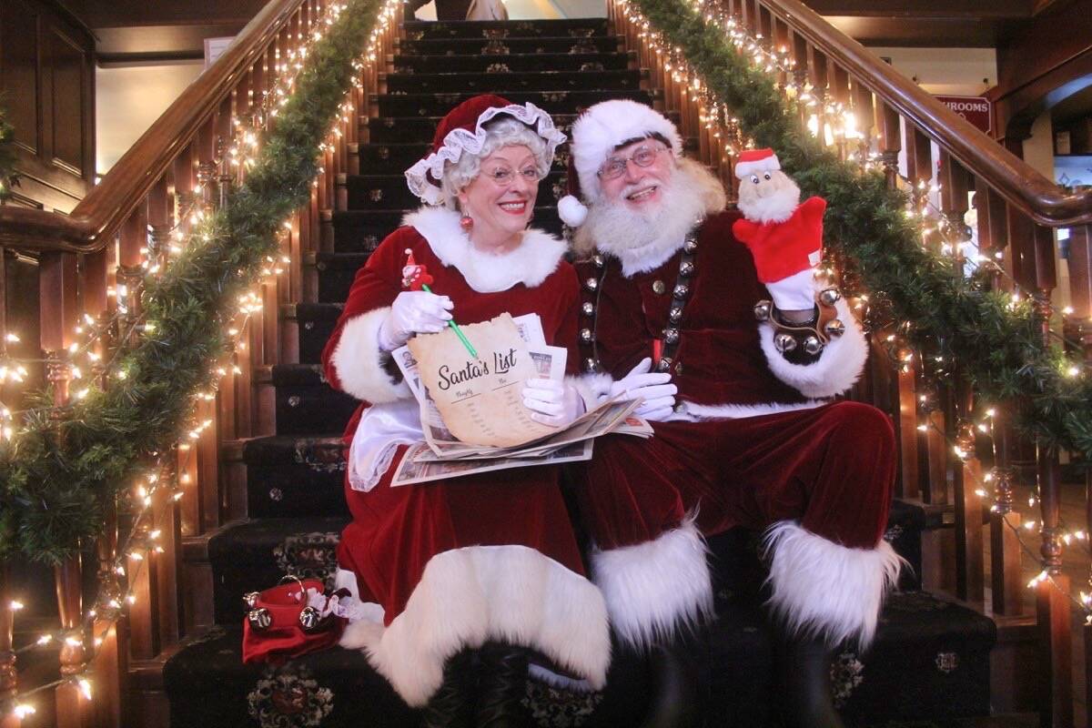 Santa and Mrs. Claus take a well-deserved break after reading through all the Black Press Media papers in Greater Victoria to update the naught and nice list. (Christine van Reeuwyk/News Staff)