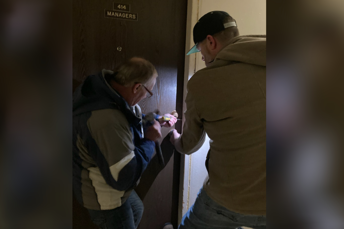 Terrace Mayor Sean Bujtas (right) gaining entry to the managers’ office at Coachman Apartments. (Submitted photo)