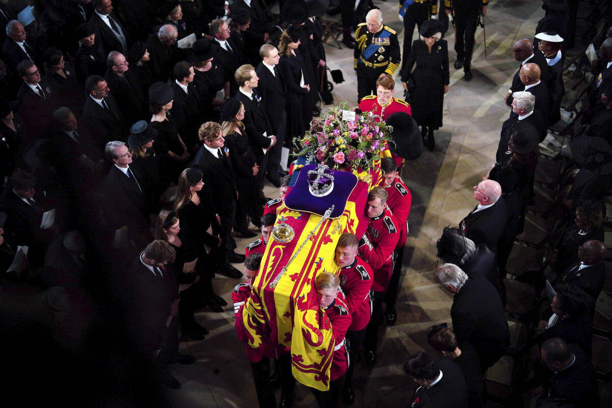King Charles III and the Queen Consort follow the coffin during the Committal Service for Queen Elizabeth II at St George’s Chapel, at Windsor Castle, Windsor, England, Monday, Sept. 19, 2022. (Ben Birchall/Pool via AP)