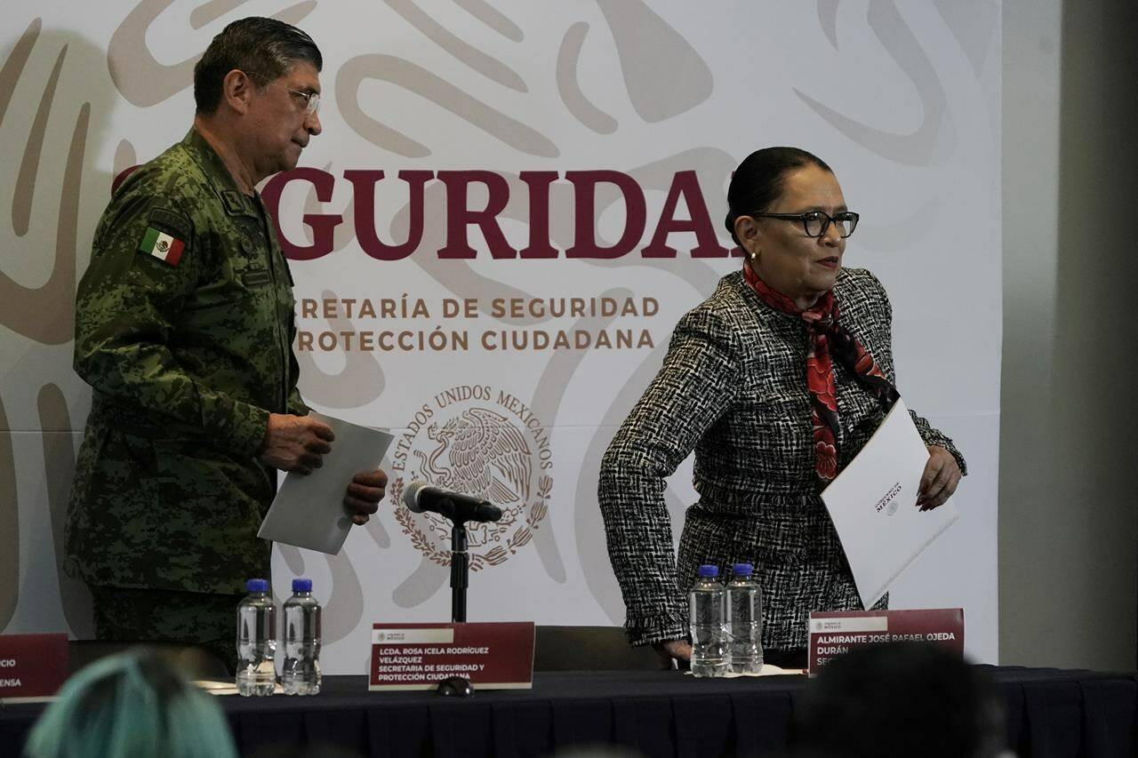 Mexican Public Safety Secretary Rosa Icela Rodriguez, right, and Mexican Defense Secretary Luis Cresencio Sandoval leave after a news conference announcing the arrest of Ovidio Guzman in Mexico City, Thursday, Jan. 5, 2023. Mexican security forces captured Guzman, an alleged drug trafficker wanted by the United States and one of the sons of former Sinaloa cartel boss Joaquin “El Chapo” Guzman, Thursday in a pre-dawn operation outside Culiacan. THE CANADIAN PRESS/AP-Eduardo Verdugo