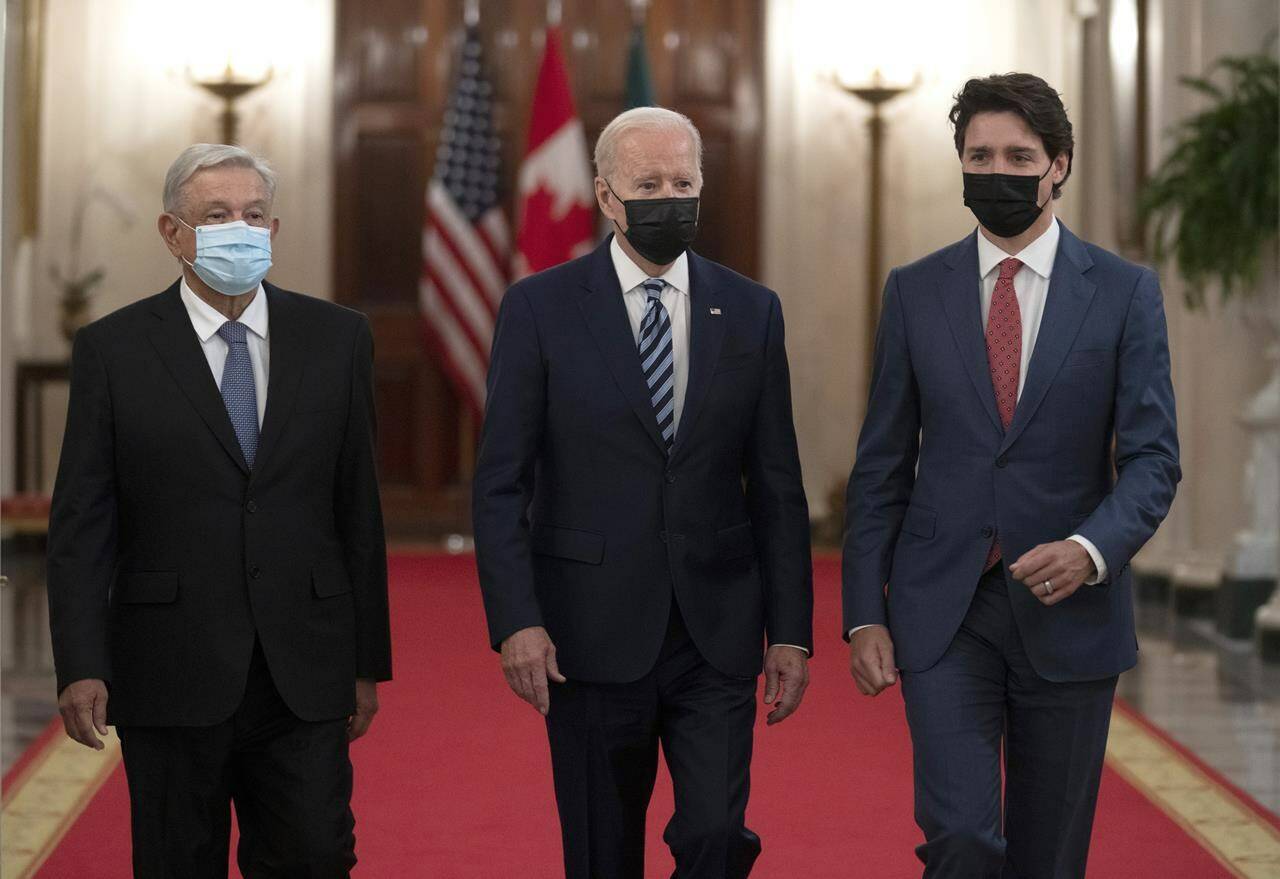 Canadian Prime Minister Justin Trudeau walks with United States President Joe Biden and Mexican President Andres Manuel Lopez Obrador to a meeting at the North American Leaders’ Summit, on Thursday, Nov. 18, 2021 in Washington, D.C. THE CANADIAN PRESS/Adrian Wyld