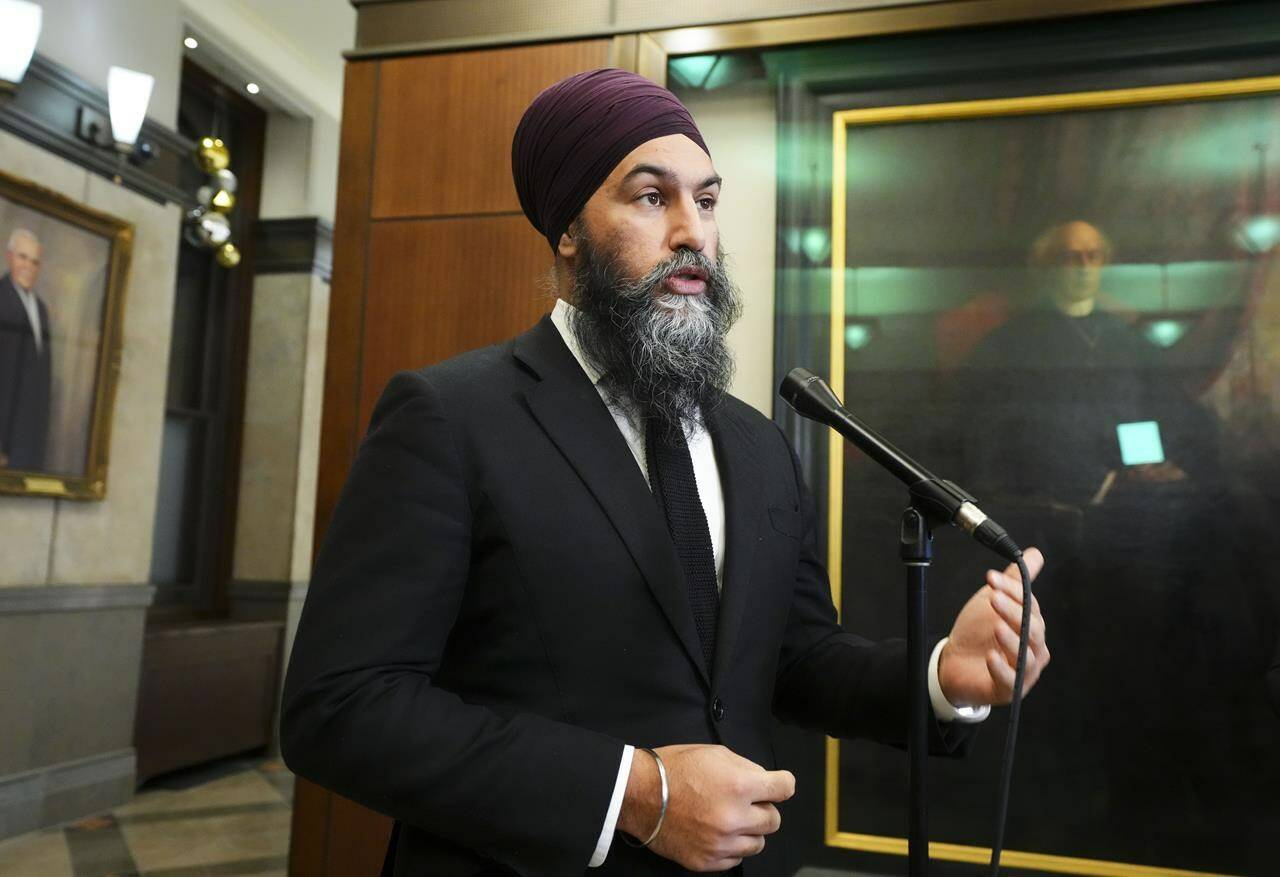 NDP leader Jagmeet Singh speaks to reporters in the foyer of the House of Commons on Parliament Hill in Ottawa on Wednesday, Dec. 14, 2022. The federal New Democrats are kicking off their three-day caucus retreat today. THE CANADIAN PRESS/Sean Kilpatrick