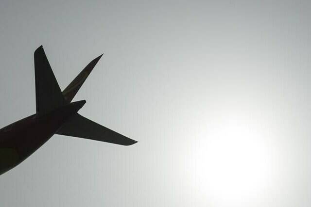 Experts say the low-cost airline model is exacerbating an already existing pilot shortage that threatens to become an even bigger problem for this country’s aviation industry in the years to come. A plane is silhouetted as it takes off from Vancouver International Airport in Richmond, B.C., Monday, May 13, 2019. THE CANADIAN PRESS/Jonathan Hayward