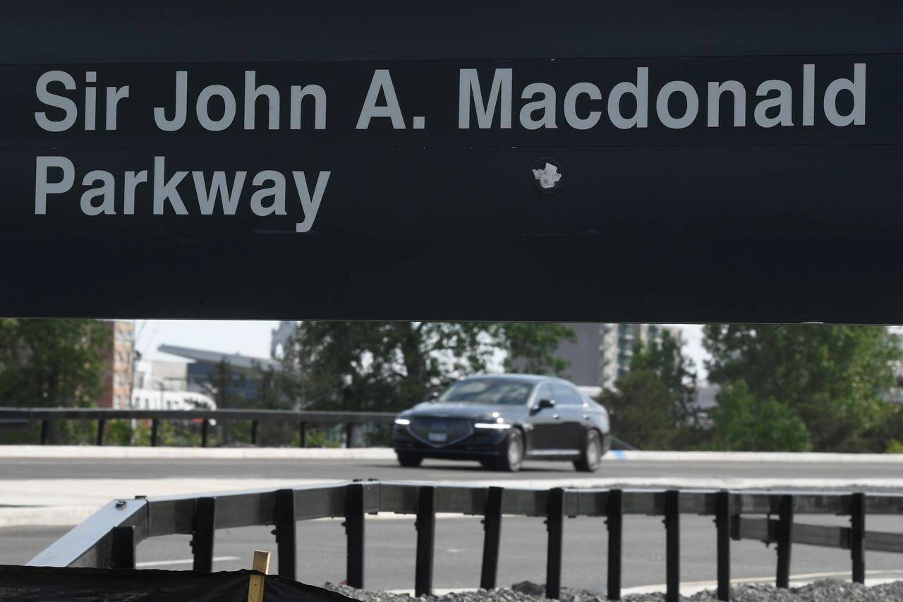 The National Capital Commission is set to provide an update on the renaming of the Sir John A. Macdonald Parkway. A vehicle travels along the parkway in Ottawa, Wednesday June 2, 2021 in Ottawa. THE CANADIAN PRESS/Adrian Wyld