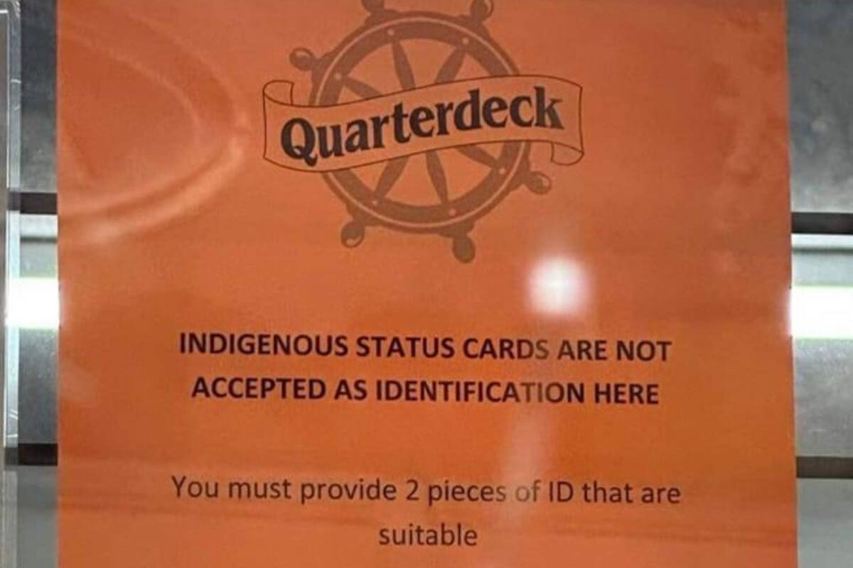The Quarterdeck beer and wine store had this old sign hanging up stating it would not accept Indigenous status cards as ID, and it was promptly taken down by new management after it went viral online. (Jozi Child - Facebook photo)