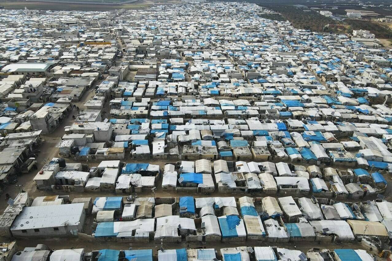 A general view of Karama camp for internally displaced Syrians, Monday, Feb. 14, 2022 by the village of Atma, Idlib province, Syria. The lawyer for six Canadian women and 13 children being held in Syrian camps says the federal government has agreed to help bring them home.THE CANADIAN PRESS/AP-Omar Albam