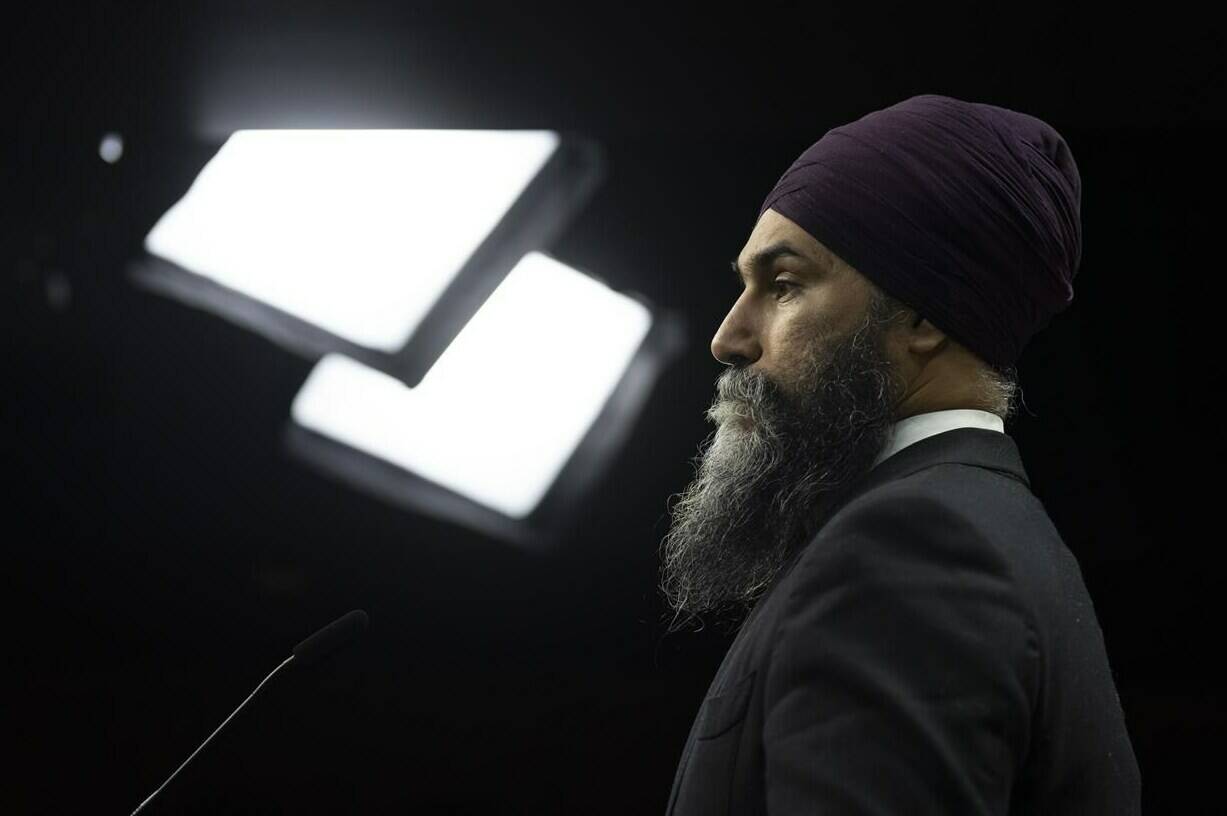 New Democratic Party leader Jagmeet Singh listens to a question during an availability on Parliament Hill, Thursday, January 19, 2023 in Ottawa. New Democrat Leader Jagmeet Singh says it will be a deal-breaker if the Liberal government doesn’t introduce a pharmacare bill in Parliament this year. THE CANADIAN PRESS/Adrian Wyld