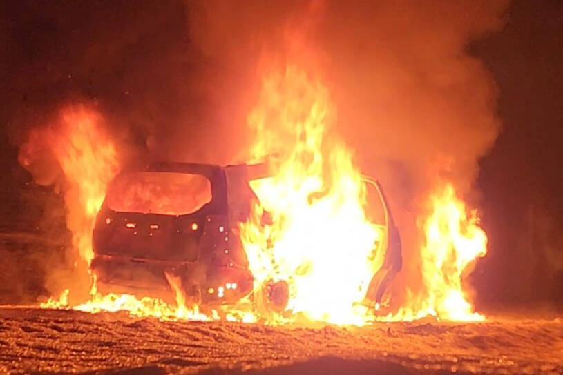 An SUV is fully engulfed in flames early Tuesday, Jan. 17. (Contributed)