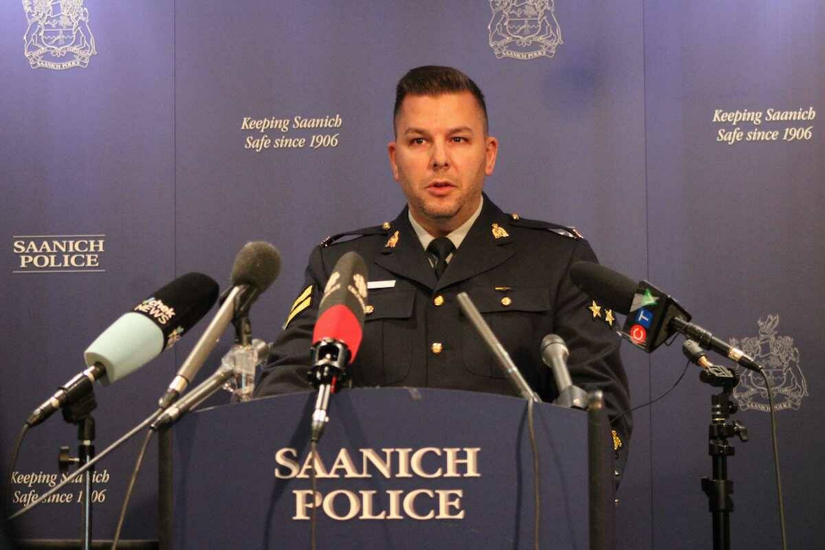 BC RCMP spokesperson Cpl. Alex Berube speaks during a press conference where the Vancouver Island Integrated Major Crime Unit released its investigation findings into the June 28, 2022, Saanich bank shootout. (Jake Romphf/News Staff)