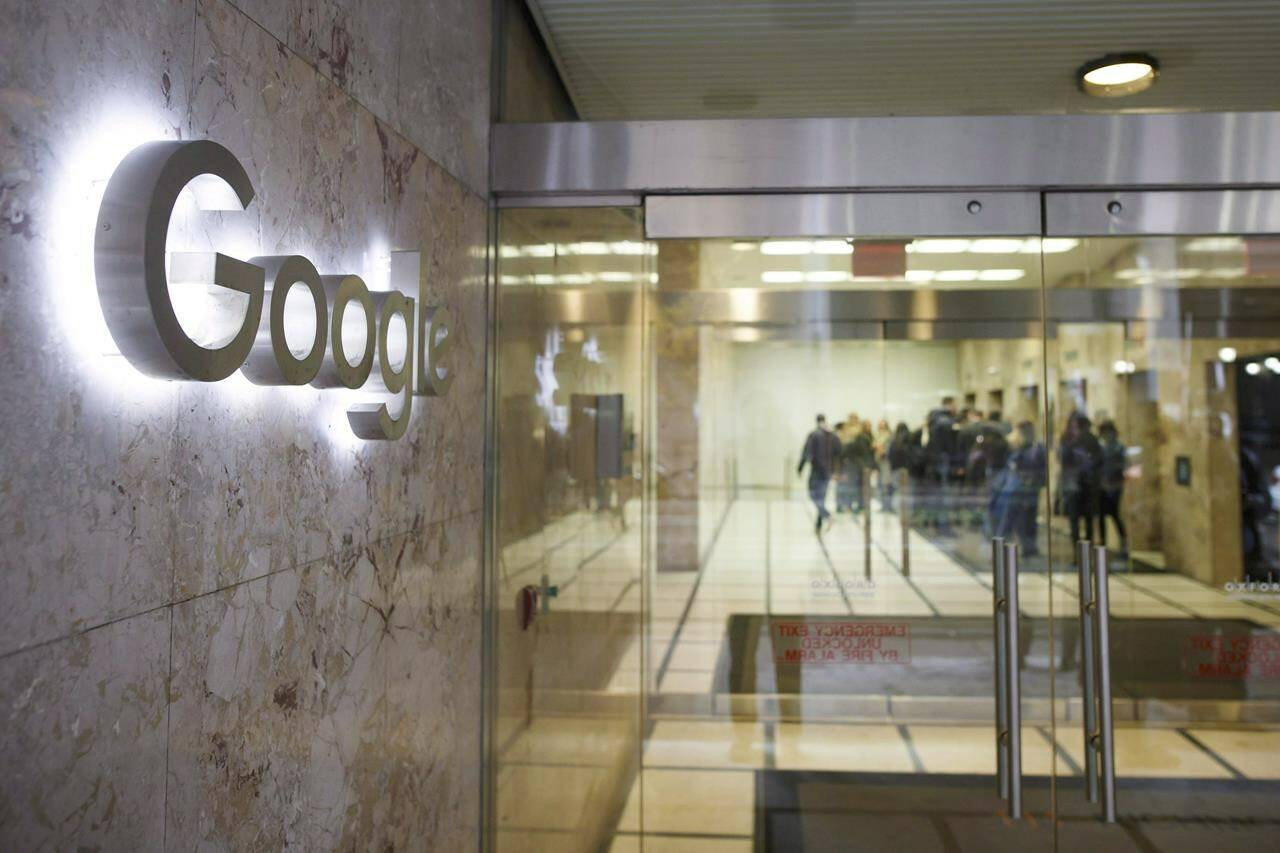 Google Canada employees return to the Google office in Toronto following a walkout in Toronto on November 1, 2018. Members of Canada’s tech industry say another wave of layoffs the sector saw this week is tipping the power dynamic back in favour of employers. THE CANADIAN PRESS/Cole Burston