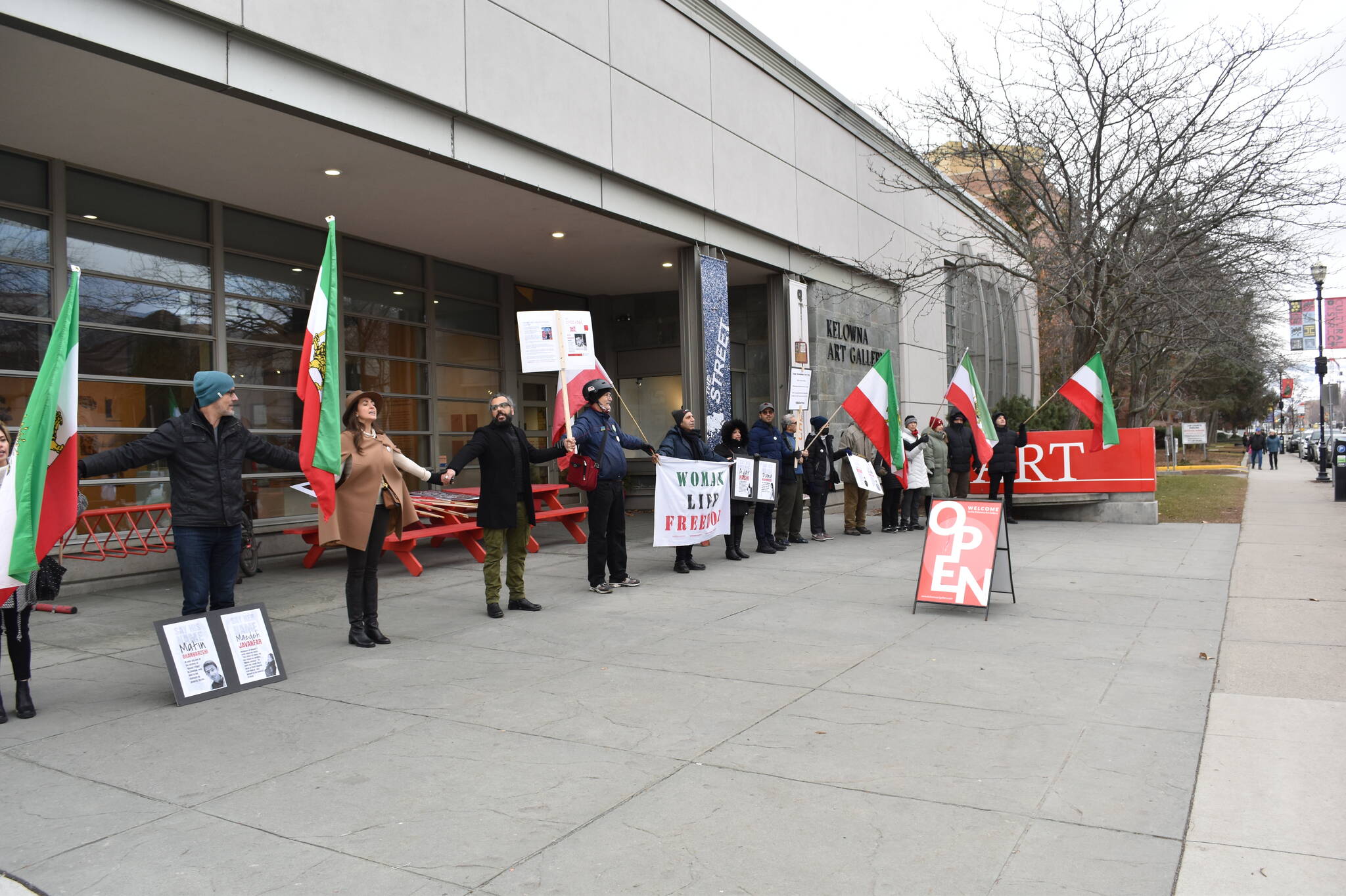 A ‘human-chain’ protest took place in front of the Kelowna Art Gallery in support of the Iran Revolution on Saturday. (Jordy Cunningham/Capital News)